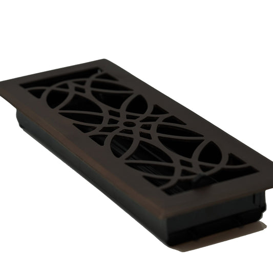 The Madelyn Carter Cast Brass Empire Vent Cover in oil rubbed bronze features a rectangular shape and a decorative geometric design.