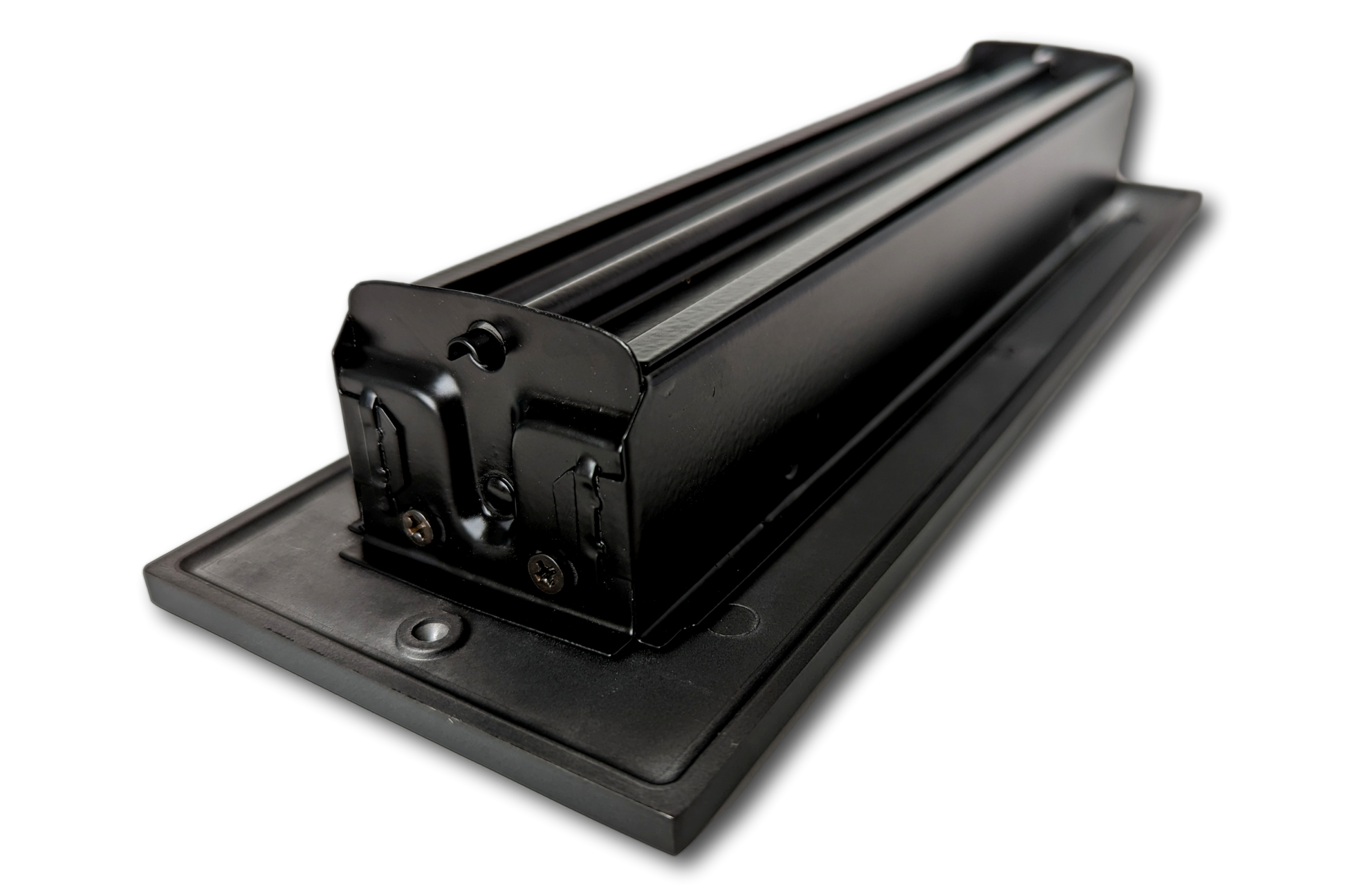 A close-up view of a black metal rolling machine on a flat base, echoing the durability of Madelyn Carter’s Cast Aluminum Linear Bar Vent Covers in Carbon Gray, photographed against a plain white background.