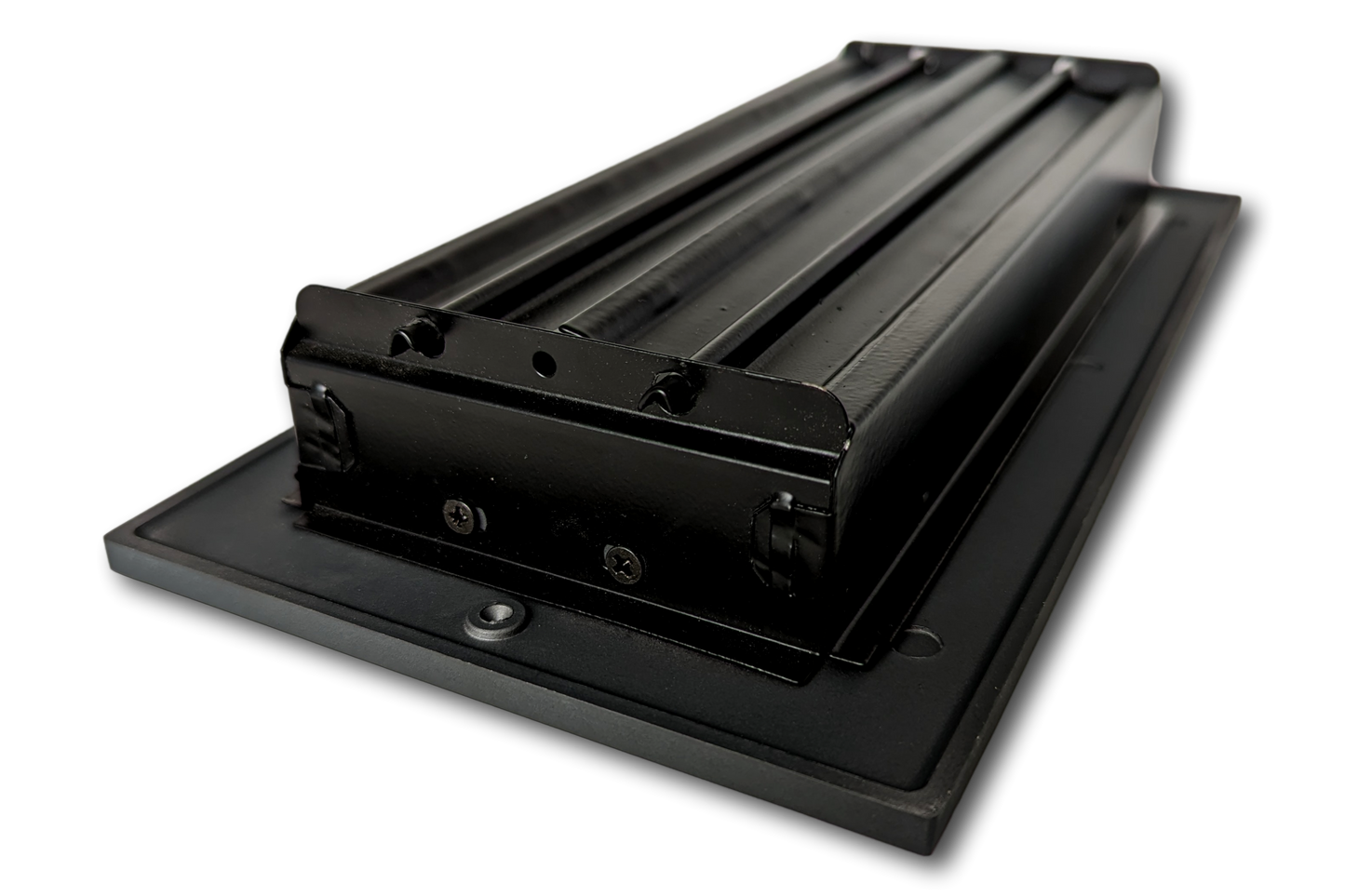 The Madelyn Carter Cast Aluminum Linear Bar Vent Cover in Carbon Gray features a sleek, black rectangular design with rollers on a flat base, photographed against a white background.