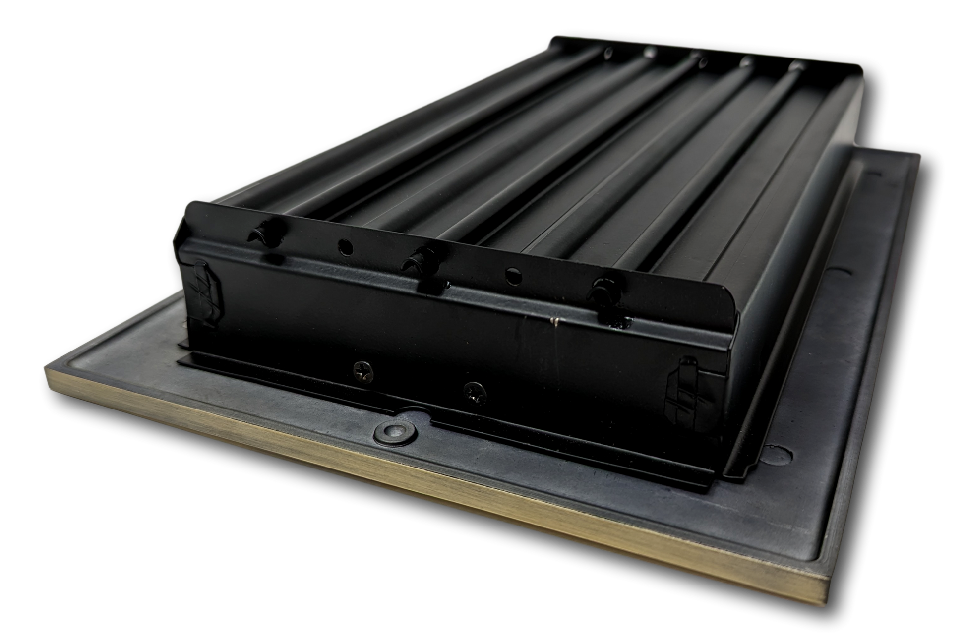 A Madelyn Carter Cast Aluminum Linear Bar Vent Cover in antique brass, shown attached to a rectangular mounting plate and viewed at an angle against a white background.