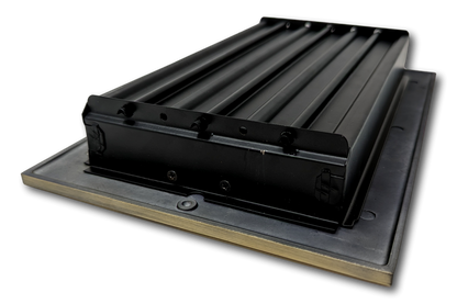 A Madelyn Carter Cast Aluminum Linear Bar Vent Cover in antique brass, shown attached to a rectangular mounting plate and viewed at an angle against a white background.