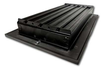 The Madelyn Carter Cast Aluminum Linear Bar Vent Cover in Carbon Gray features a flat base with raised, angled slats. Rust resistant and stylish, this durable vent cover is shown on a white background, perfect for any space.