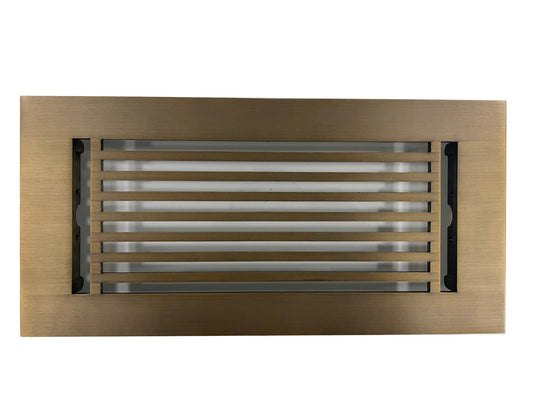 The Madelyn Carter Cast Aluminum Linear Bar Vent Cover in Antique Brass features horizontal slats and a rust-resistant finish, shown against a white background.