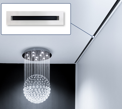 A modern chandelier with hanging glass spheres is mounted on the ceiling; a close-up detail highlights the Dayus Slot Linear Diffuser w/ Mud-In Flange (DASLJ) installed along the ceiling edge.