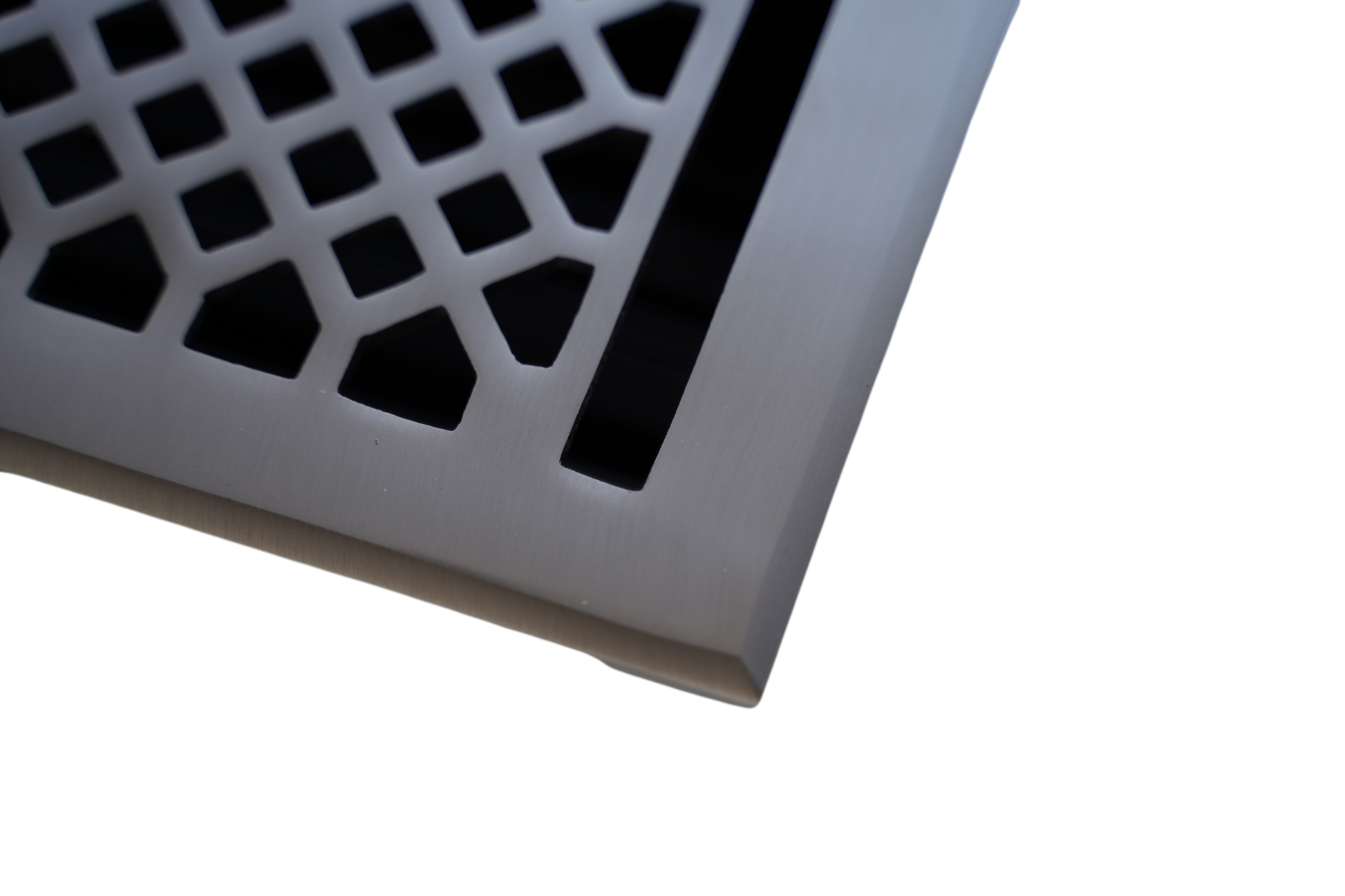 Close-up of the Madelyn Carter Cast Brass Vintage Industrial Vent Cover in brushed nickel, featuring a geometric cutout pattern against a white background.