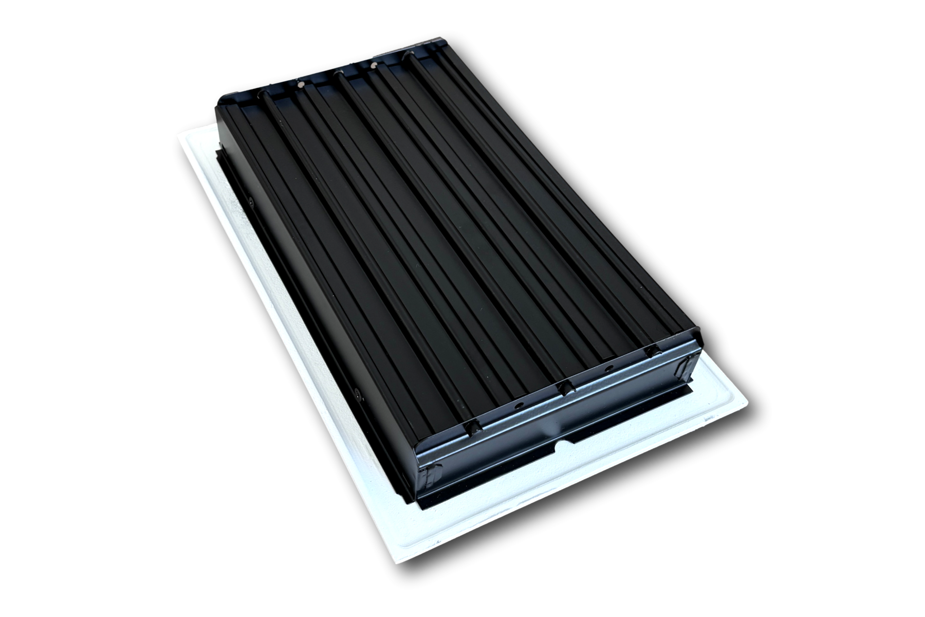 The Madelyn Carter Cast Aluminum Arts & Crafts Vent Cover in white, with vertical ridges, is displayed mounted on a white base against a plain background.