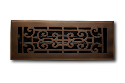The Madelyn Carter Cast Brass Baroque Vent Cover features ornate scrollwork and an oil rubbed bronze finish, showcased against a plain background.