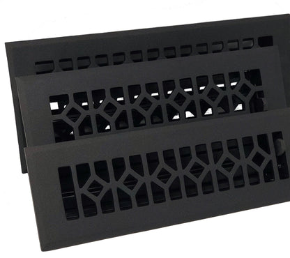 Three Madelyn Carter Cast Aluminum Roman Vent Covers in black, featuring a geometric diamond and rectangle pattern, are arranged overlappingly on a white background.