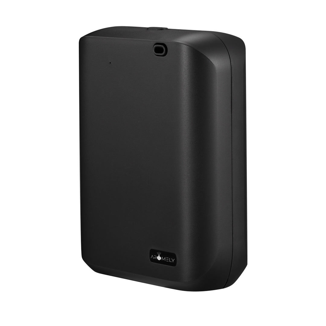The Aromely Smart Scent Diffuser for Home, Office & SPA by AROMELY is a black rectangular wall-mounted device with a small indicator light and logo, designed for cold air diffusion of essential oils in spaces up to 1,000 SQFT.