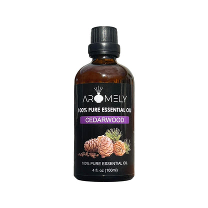 A brown glass bottle labeled "AROMELY Cedarwood Essential Oil" (4 fl. oz/100ml) featuring cedar cones and needles on the front, perfect for diffusers and prized for its calming aroma.