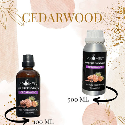 Two bottles of AROMELY Cedarwood Essential Oil (100 ml and 500 ml) with decorative leaf designs are shown. Add a few drops to your diffuser for a calming, soothing aroma.