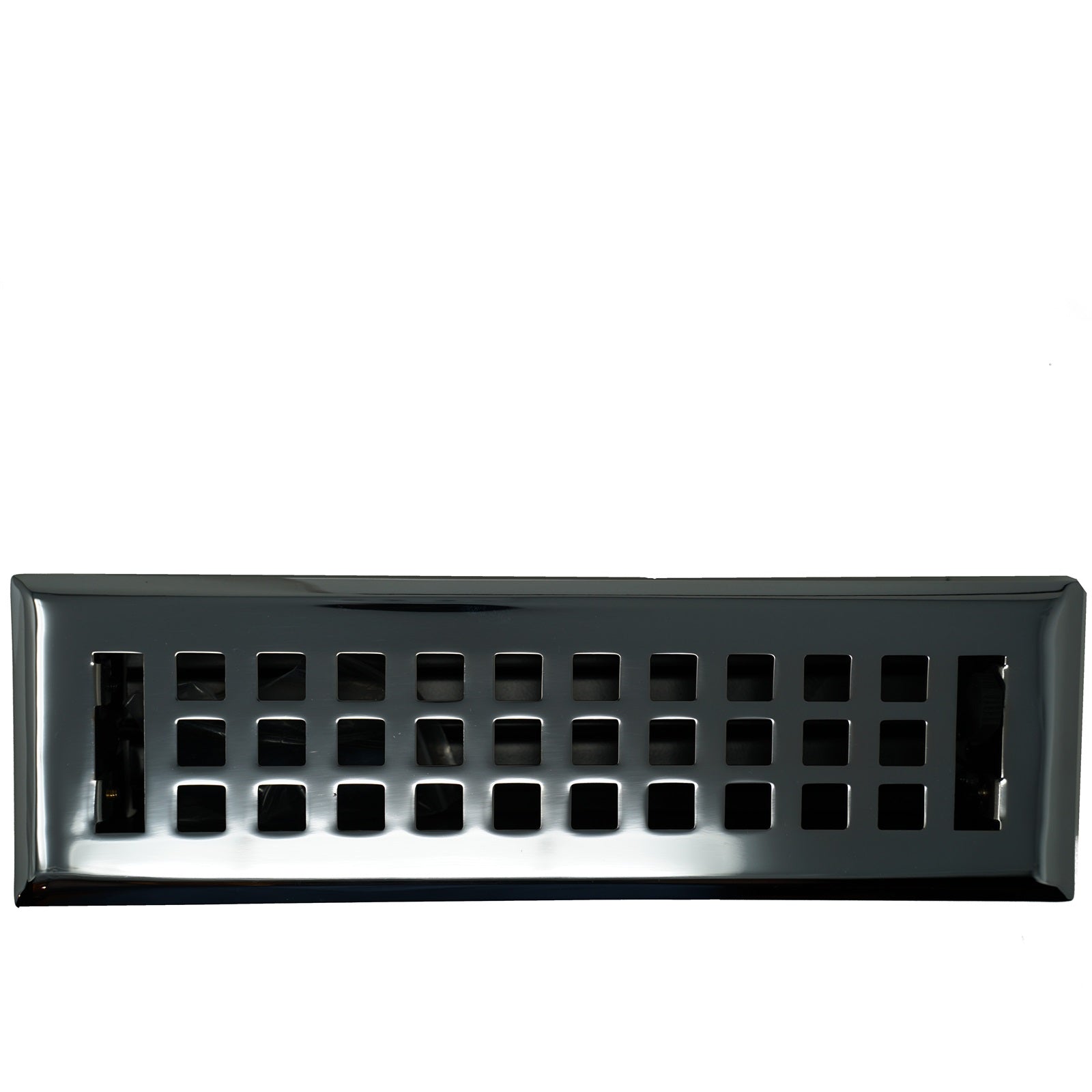 A Madelyn Carter Cast Brass Artisan Vent Cover in polished chrome, featuring a rectangular shape and a grid of square openings, photographed against a white background.