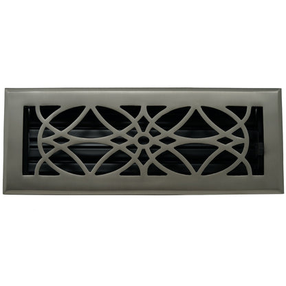 The Madelyn Carter Cast Brass Empire Vent Cover in brushed nickel features a decorative geometric design and black louvers behind the grille.