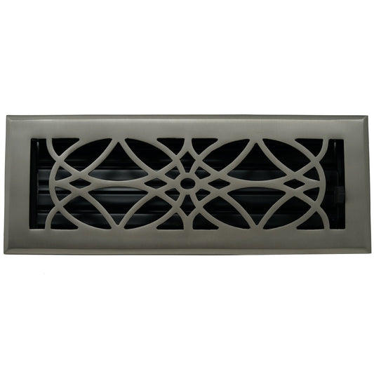 The Madelyn Carter Cast Brass Empire Vent Cover in brushed nickel features a decorative geometric design and black louvers behind the grille.