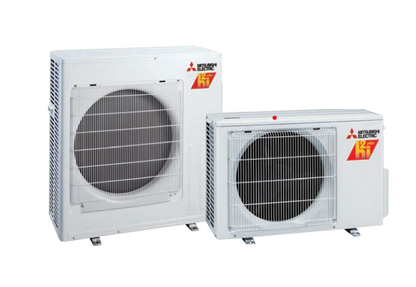 Two Mitsubishi Outdoor Single Zone Hyperheat Condenser units (MUZ-FS) with protective front grilles are placed side by side on a white background, showcasing advanced hyper-heating technology for superior heating performance.